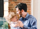 Jeff Kaufman ’08 dances with his daughter Lily